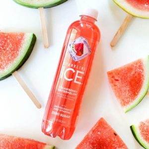 Watermelon infused with tequila and sparkling ice makes a delicious frozen popsicle.