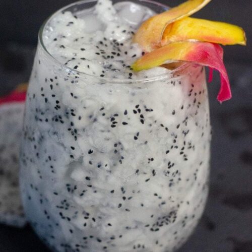 Mother of Dragon Fruit Coctail Recipe inspired by Game of Thrones garnished with fresh dragon fruit and served over ice