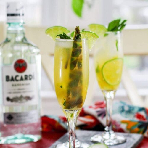 pineapple mojito garnished with pineapple spear
