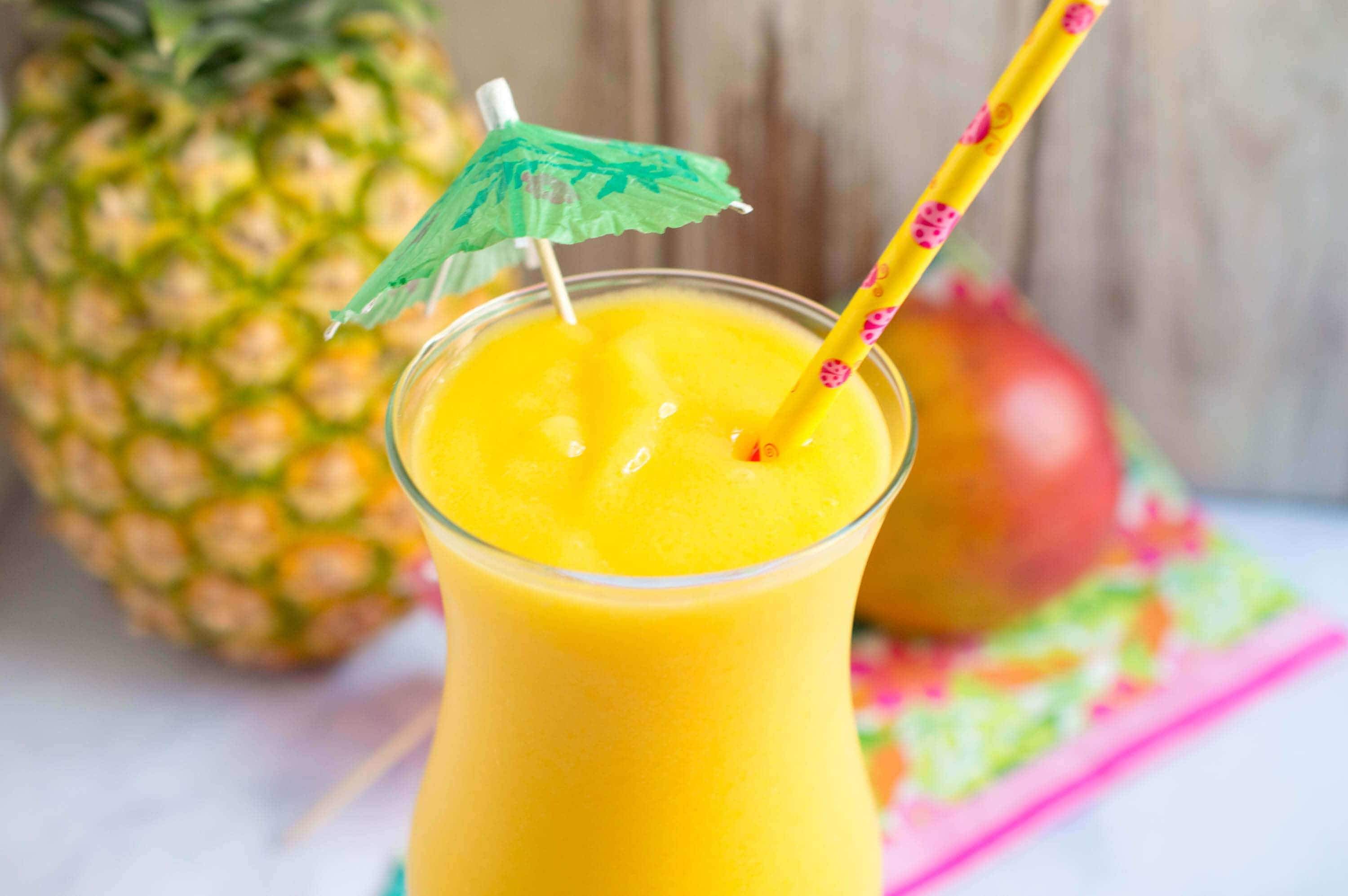 https://champagneandcoconuts.com/wp-content/uploads/2019/07/Cocktail-Recipe-for-Pineapple-Mango-Slush.jpg