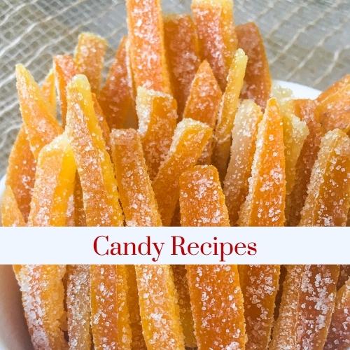 A plate of orange slice candy with text: candy recipes.