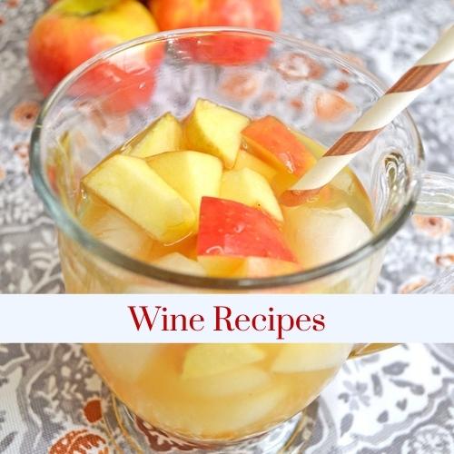 A glass of wine with apples with text: wine recipes.